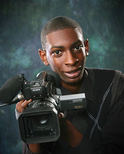 A picture of Darius Faison with a camera